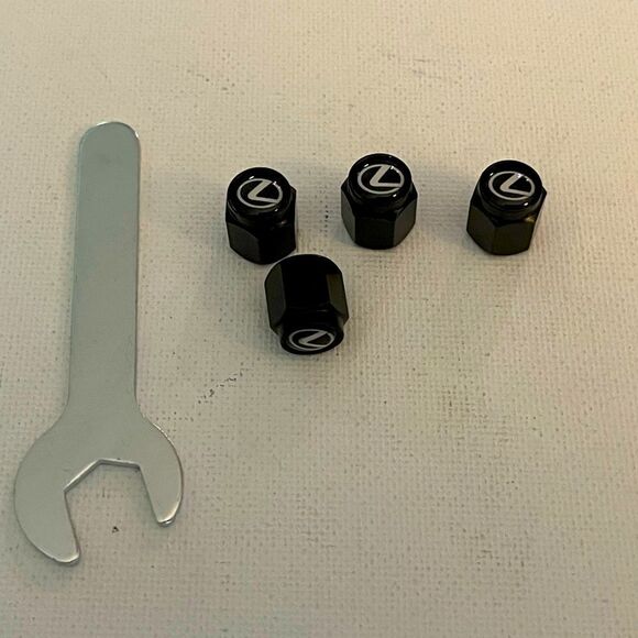 Lexus logo valve Stem caps in Black set of 4 with Logo NWT - Picture 1 of 4